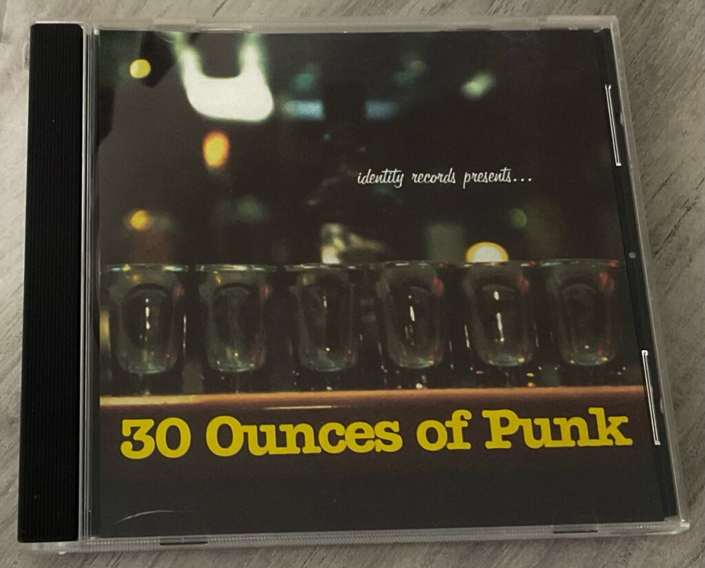 A CD of the “30 Ounces of Punk” compilation released by Identity Records in 1998.