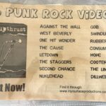 A cutout of a print ad advertising the VHS punk rock video compilation, Upthrust by In Your Face Productions.